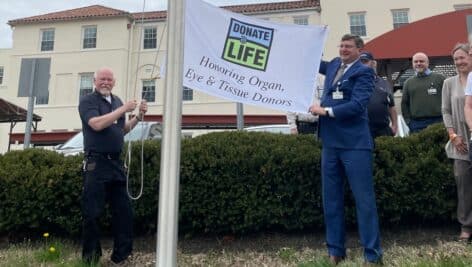 In honor of National Donate Life Month, Chester County Hospital hosted a flag-raising ceremony yesterday with members of CCH leadership and hospital staff to honor organ donors and recipients.