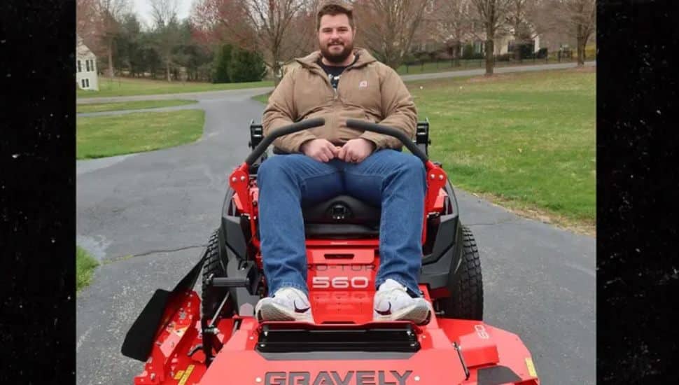 Landon Dickerson on his lawn mower