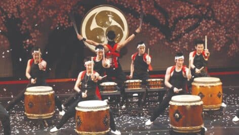 Tamagawa University Taiko drummers and dancers performing.