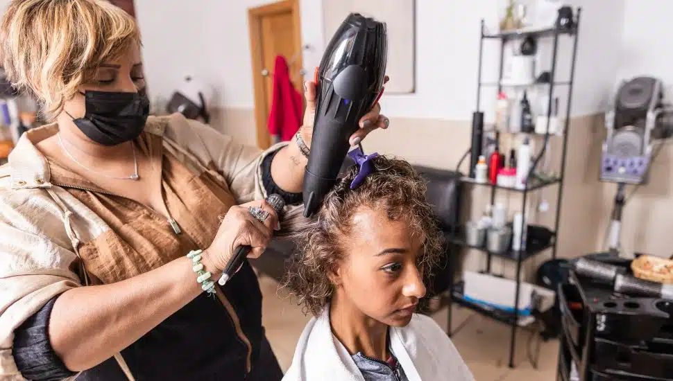 woman doing hair