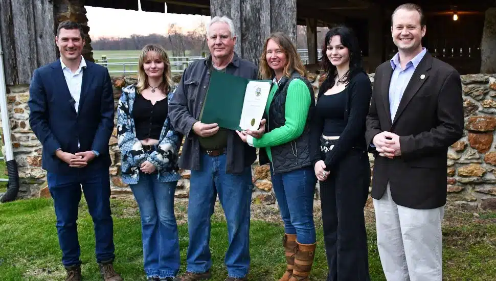 josh Maxwell, Emma Cochran, Robert and Adrienne Cochran, Abbey Cochran, and Commissioner Eric Roe