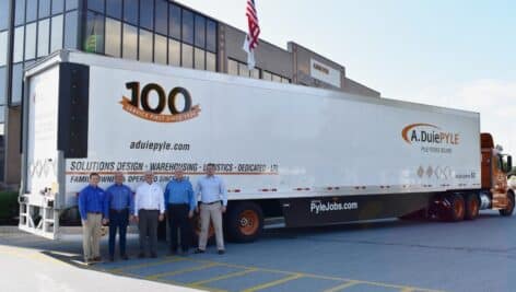 A. Duie Pyle truck with family in front