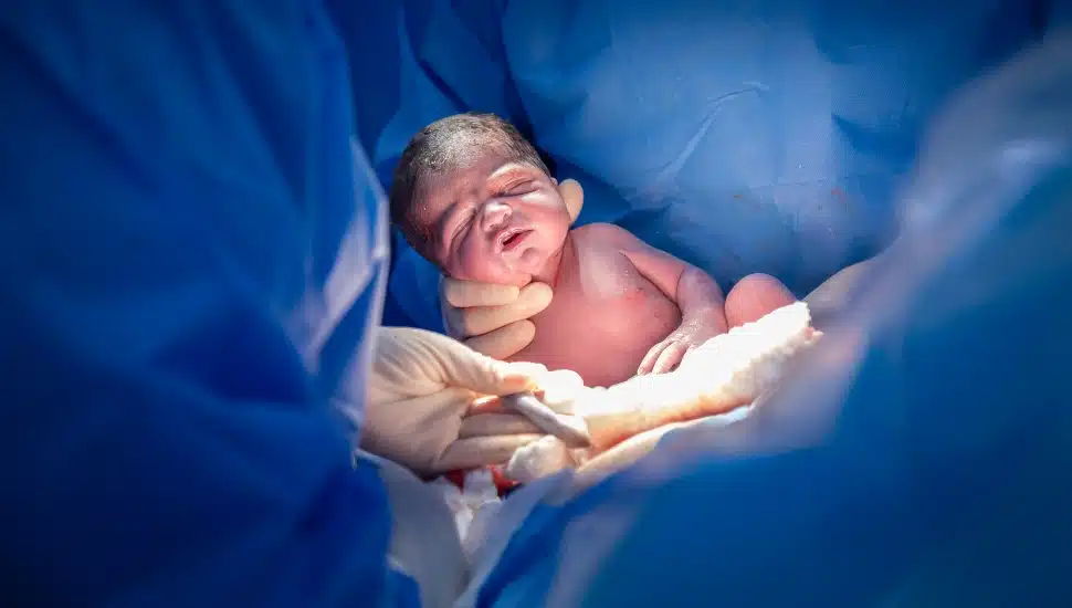 Baby being born