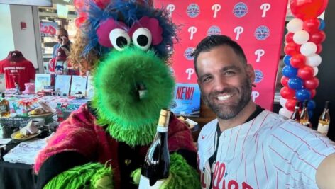 man with philly phanatic's mom