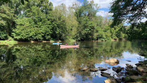 people kayaking on lake