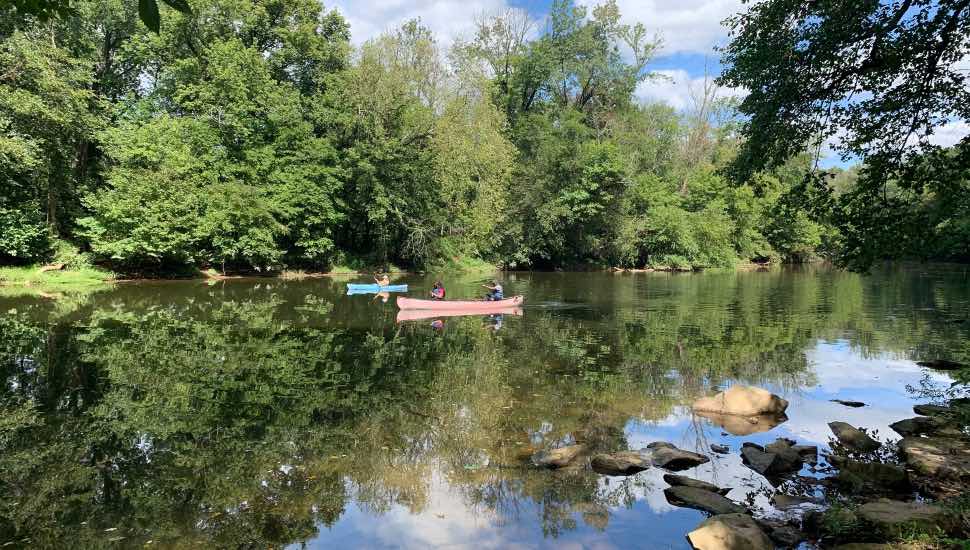 people kayaking on lake