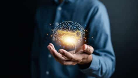 man holding computerized brain image