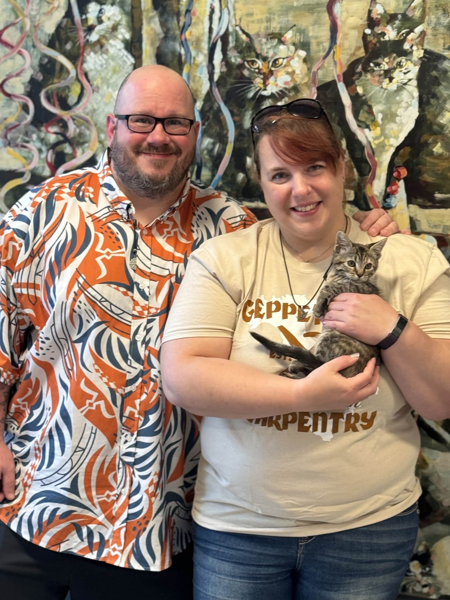 roo the kitten with her new family