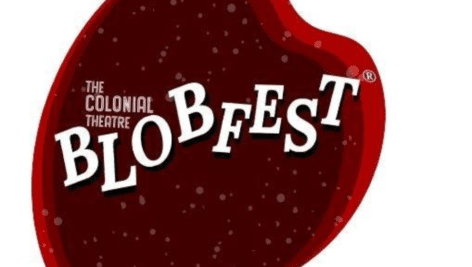 Image of a red blob shape with the text "The Colonial Theatre Blobfest."