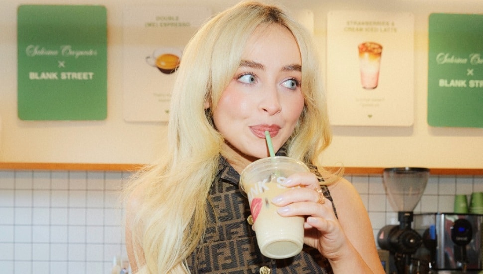 Sabrina Carpenter sipping coffee