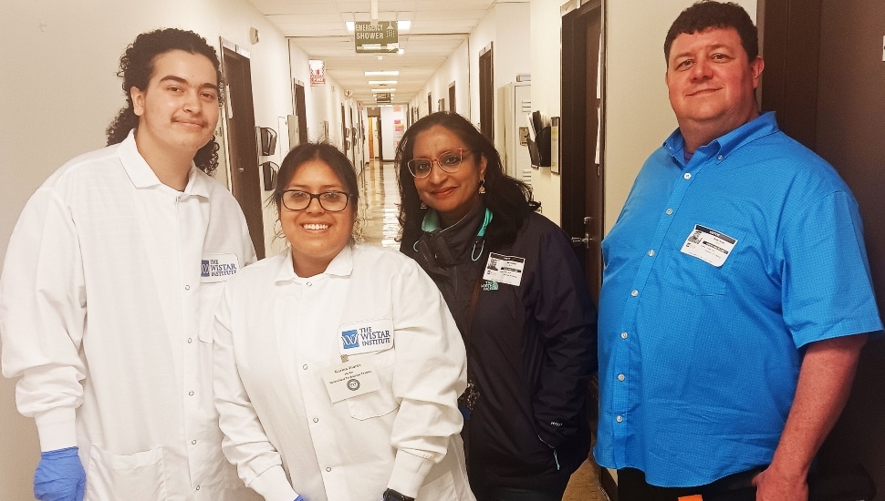 Jay Rhoades of Ridley Park and Karina Juarez of Collingdale (two of seven DCCC students selected to the Wistar Institute Biomedical Technician Training Program) with DCCC Biology professors Bela Dadhich, PhD and Robert Suran, PhD.