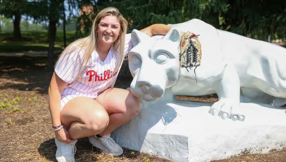 Penn State Brandywine alumna Farrell Everett poses with the Nittany Lion statue on the Penn State Brandywine campus. Penn State Brandywine alumna Farrell Everett poses with the Littany Lion statue on the Penn State Brandywine campus.