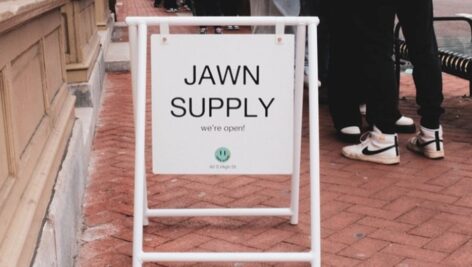 people standing in line outside of Jawn Supply