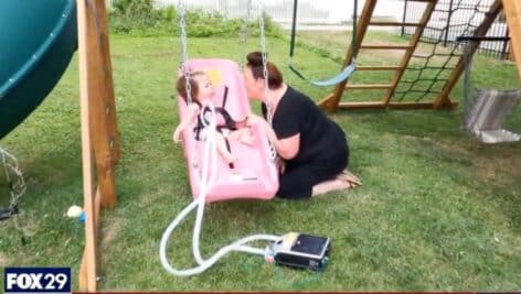 Kristy and London Thompson on her new play set.