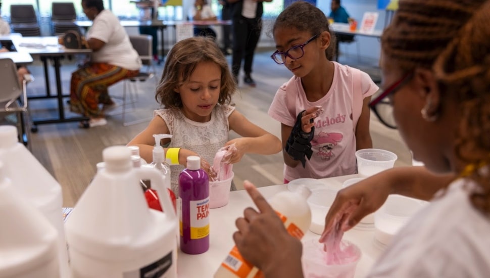 Kids engaging in STEM activities.