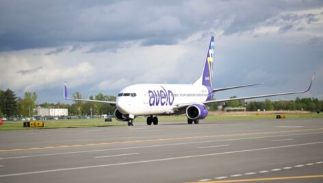 Avelo airlines plane taxing on the runway.