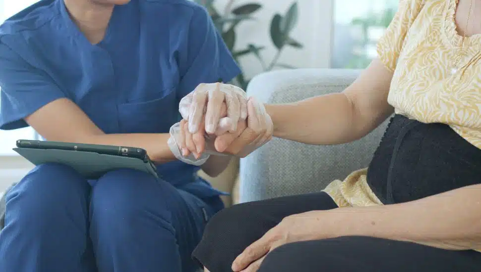 home caregiver with patient