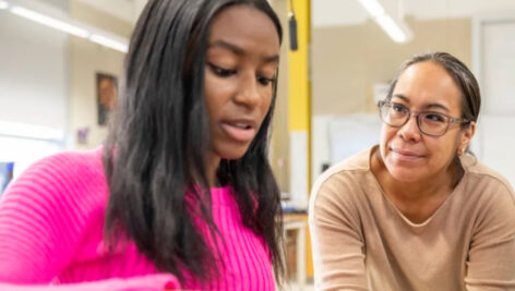 Eva Porter with a student.