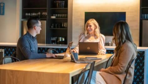 people on laptops at table