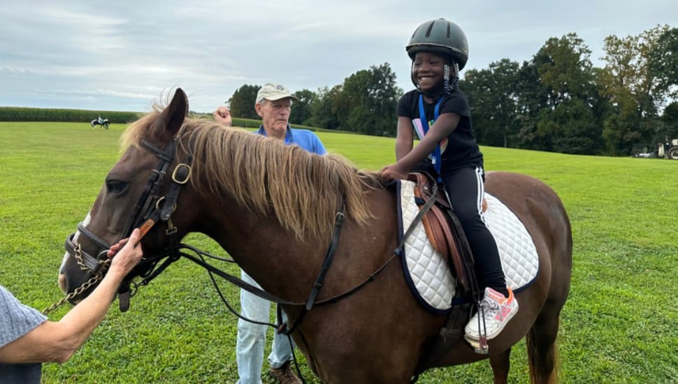 child on horse at camp dreamcatcher