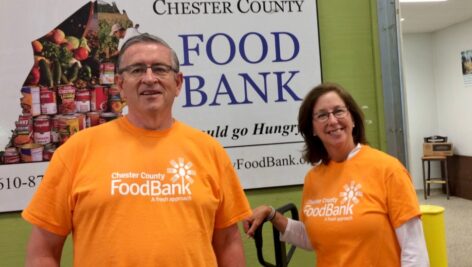 CCFB volunteers in orange shirts for Hunger Action Month.