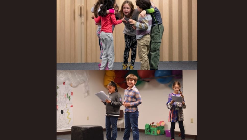 Kid gathered on stage/practicing theater.