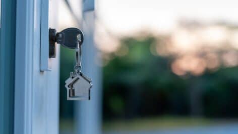 key in door of new home