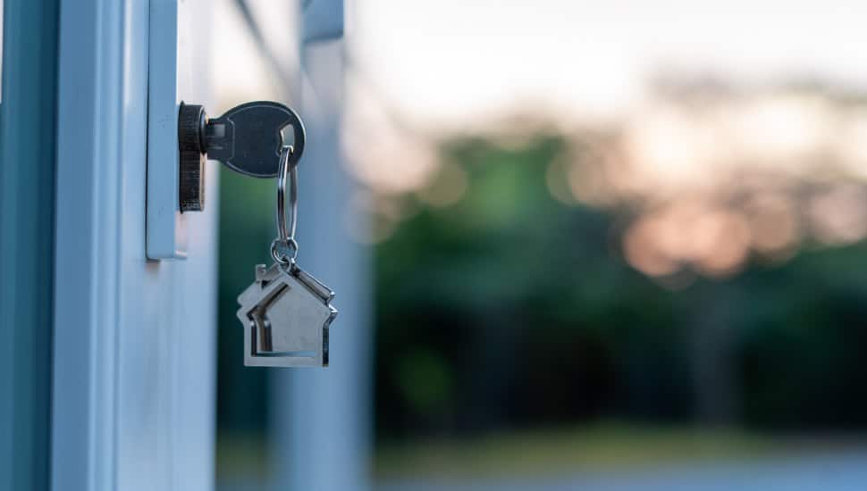 key in door of new home