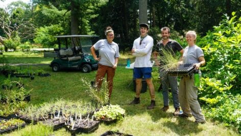 natural lands staff working outside