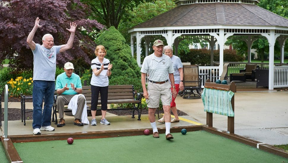 Residents of Freedom Village at Brandywine play some bocce.