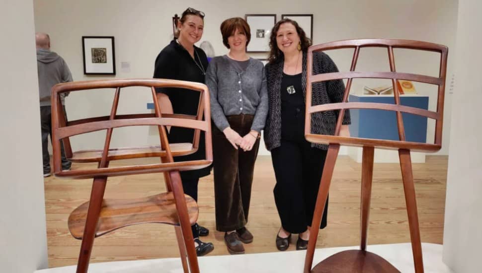 museum curators at exhibit