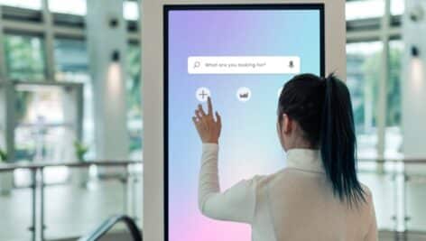 woman using interactive wayfinding system