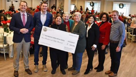 County commissioners present a check to Brandywine Valley Active Aging.