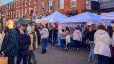 People attending booths at last year's Christkindlmarkt.