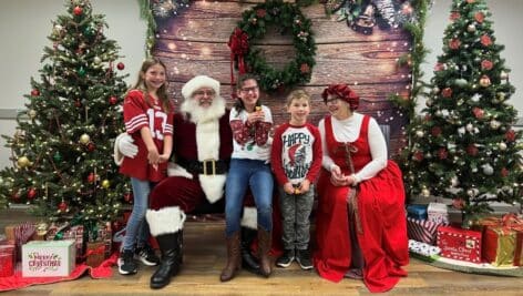 The Guay Family enjoys a visit with Santa at the Arc's Annual Holiday Fun Fest.