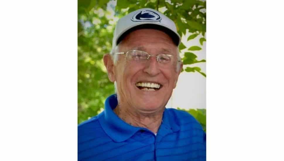 Arnie Kring in hat and glasses.