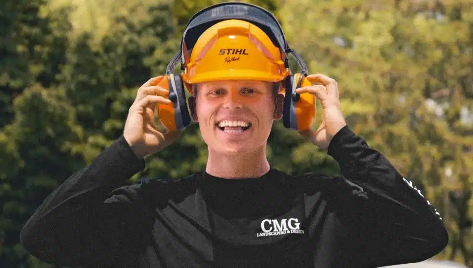 Chase Gallagher smiling wearing hard hat.