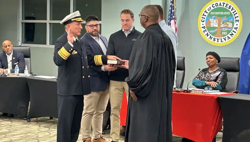 Peter Huf being sworn in.