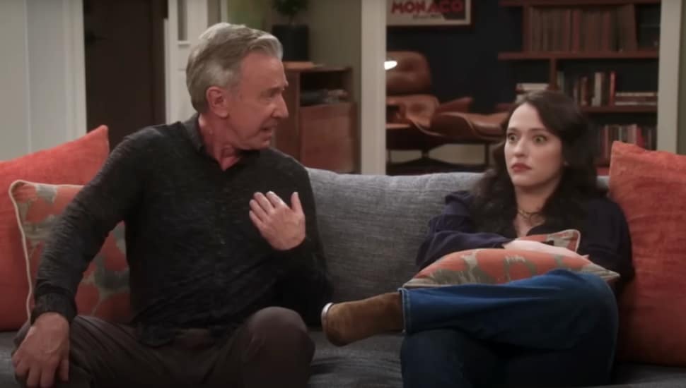 Actress Kat Dennings sitting next to actor Tim Allen.