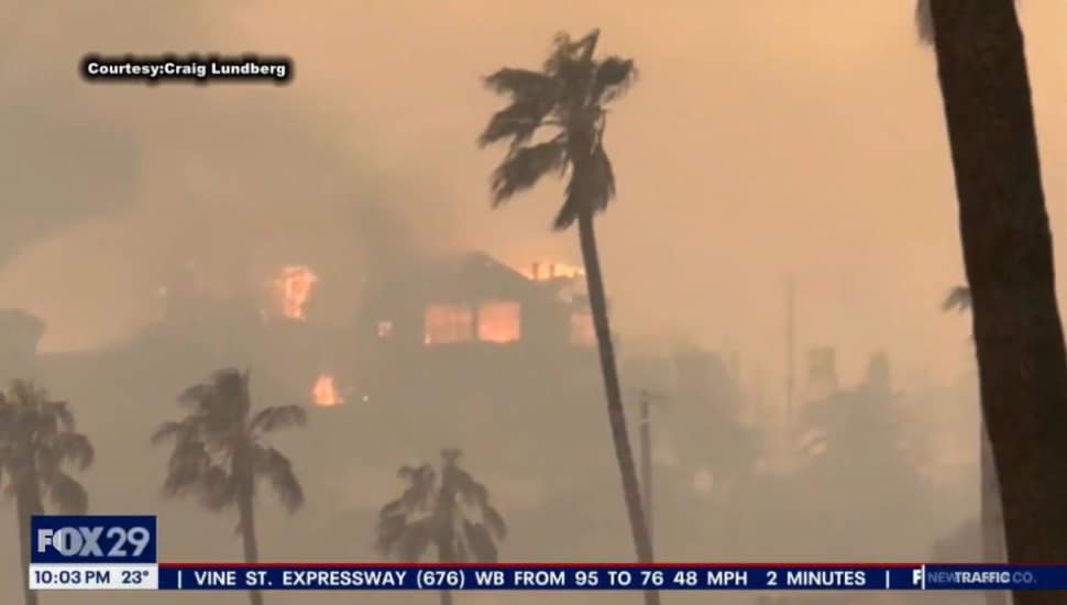 LA fire with house and trees burning.