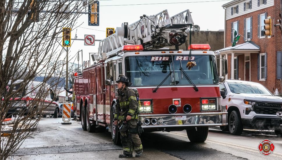 Firefighter and firetruck outside in West Chester.