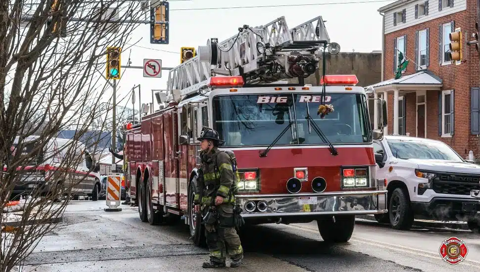 Firefighter and firetruck outside in West Chester.