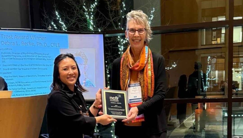 Dr. Debra Berke receiving the Jan Trost Award.