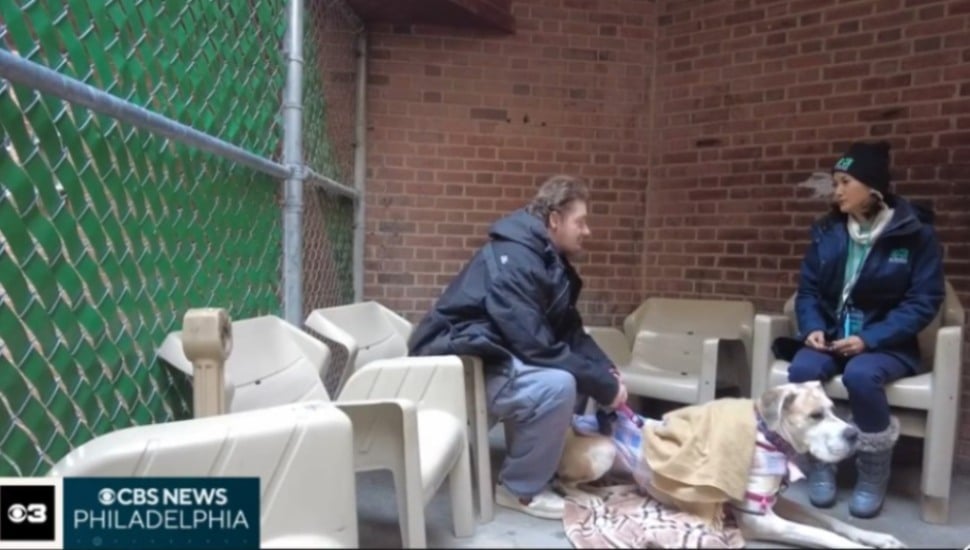 Mental Health Partnerships worker talks to homeless person.