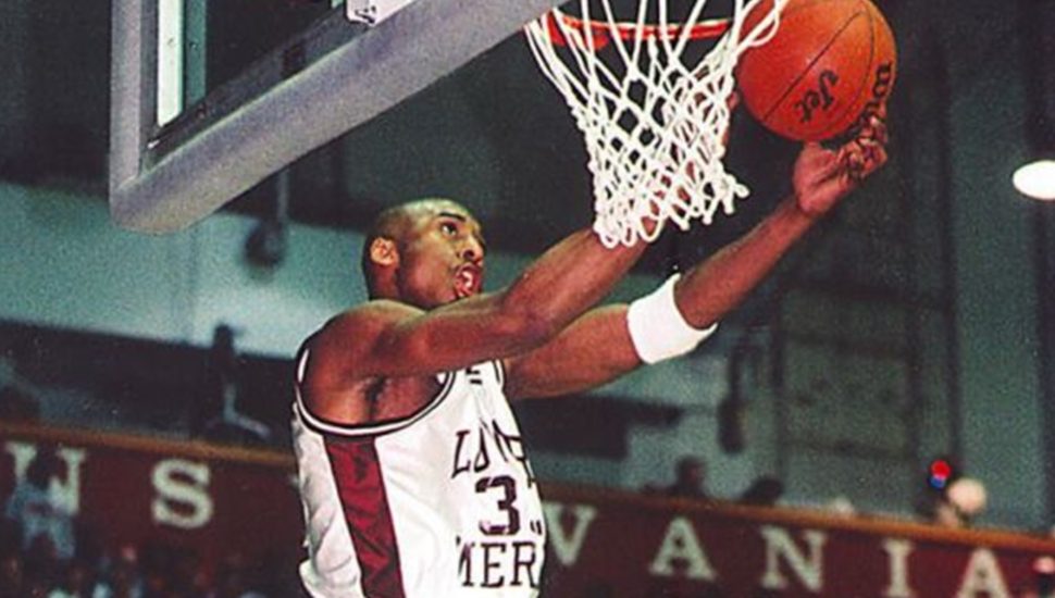 Old Kobe Bryant photo of him dunking.
