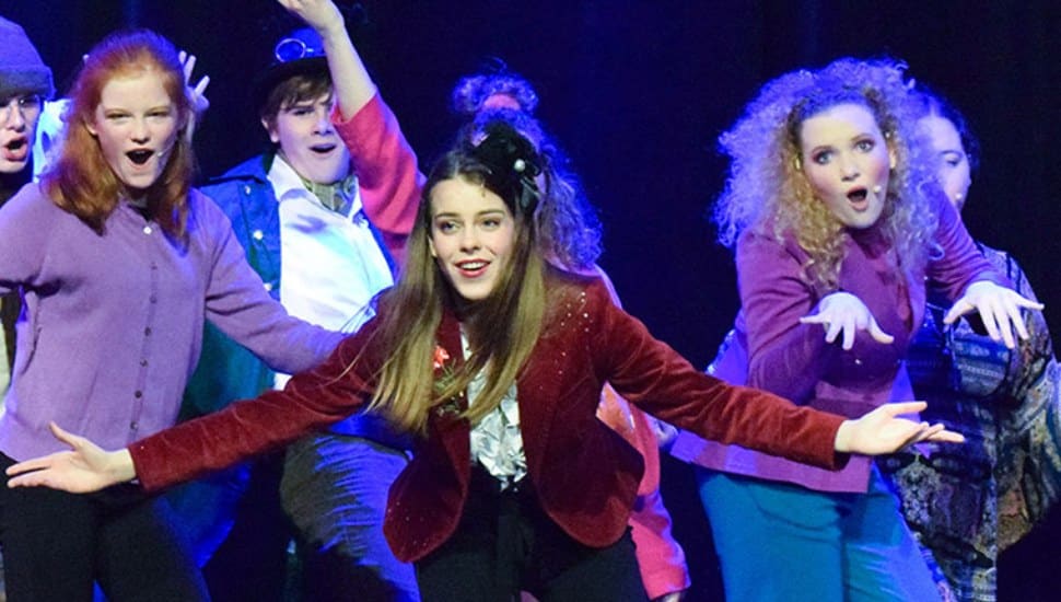 Teens at Uptown Studio performing during a summer camp class.