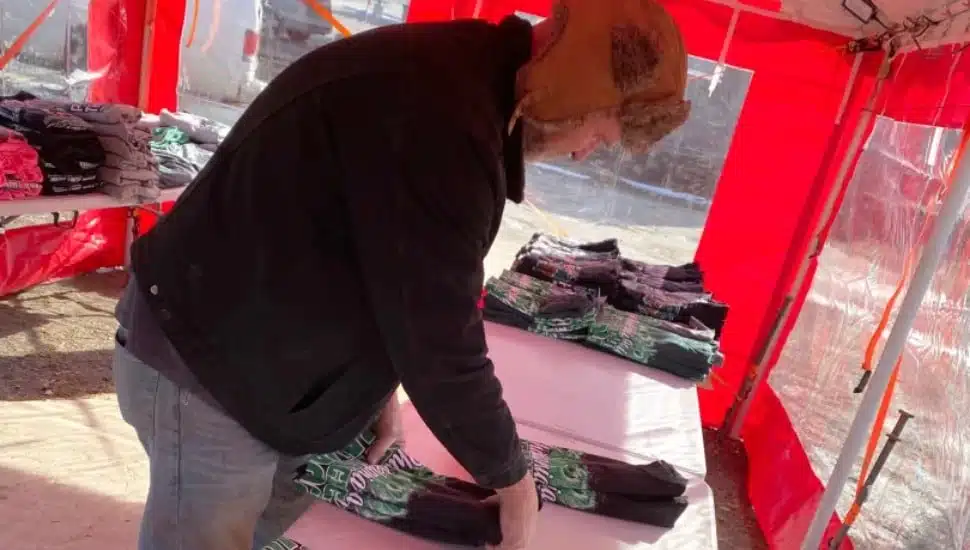 Person getting Eagles merch.