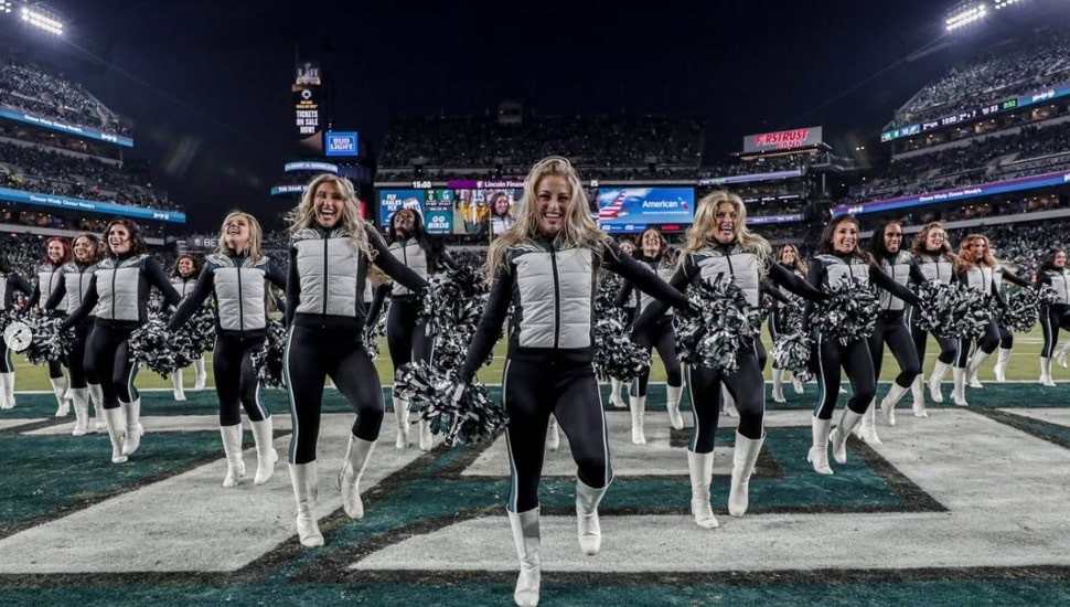 Eagles cheerleaders dancing on the field.