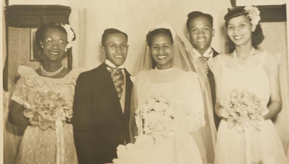 Hester and Leon Petty on their wedding day, center.