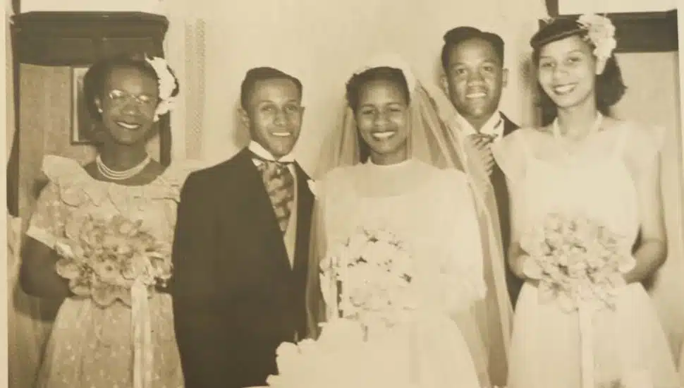 Hester and Leon Petty on their wedding day, center.